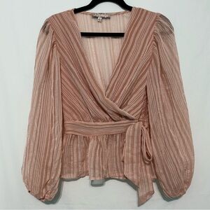 A. Calin by flying tomato blouse with long puffy sleeves and tie waist